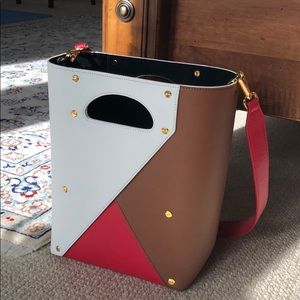 Yuzefi crossbody bag with Tag on